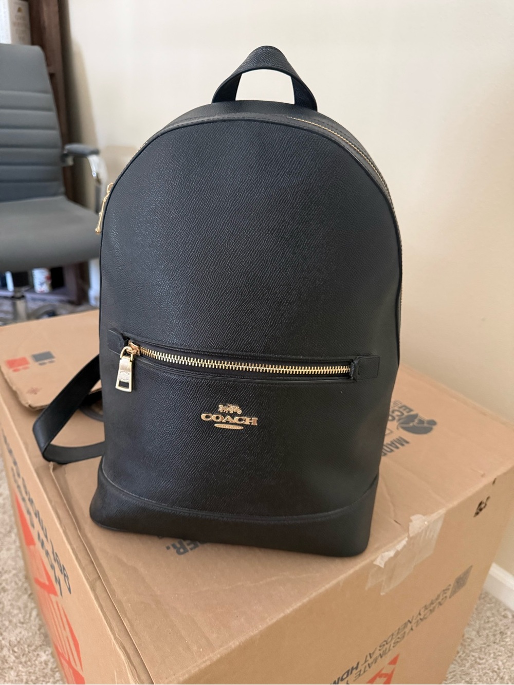 Coach Black Leather Backpack with Gold Hardware